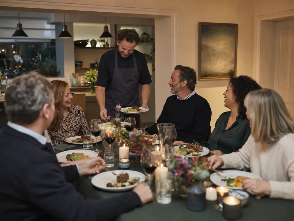 Guests enjoying a private dinner served by a personal chef